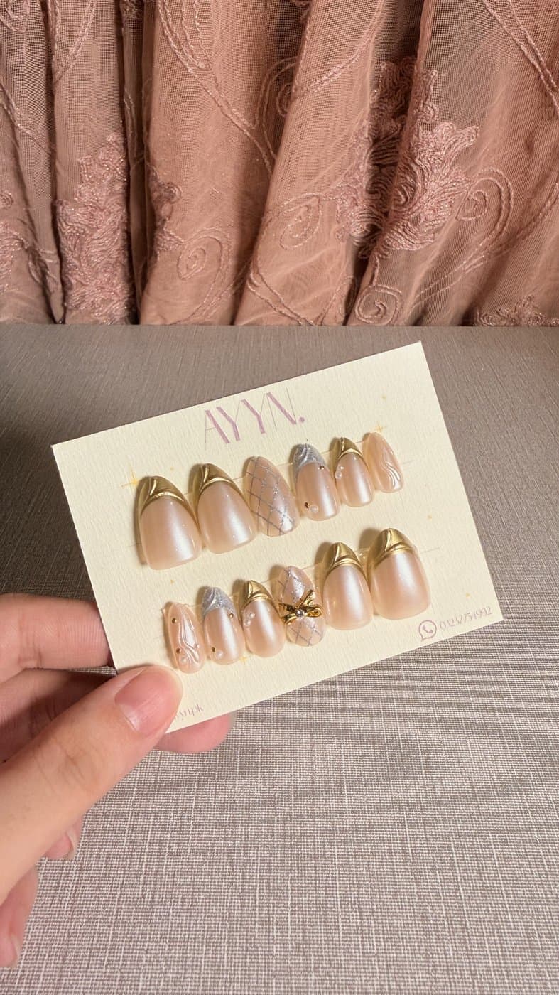 Champagne Luxe — Design #15 press-on nails by AYYN. PKR 800